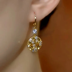 Close-up detail of the sparkling zircons and plating on the Brown Drop Earrings