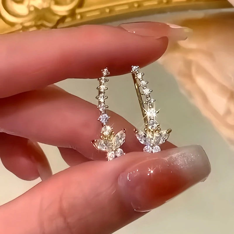 Angled view of the 14K Gold-Plated Elegant Zircon Butterfly Diamond Crawler Earrings