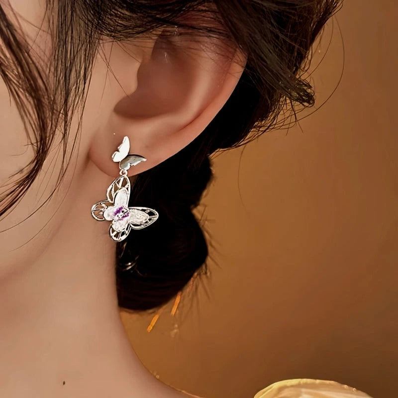 Close-up detail of the sparkling zircons and plating on the Pink Butterfly Earrings