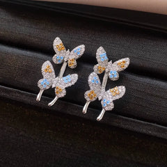 Angled view of the 14K Gold-Plated Elegant Zircon Butterfly Jacket Earrings