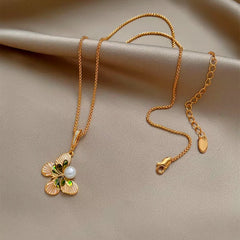 Close-up of the pendant and clasp on the Butterfly Pearl Necklace