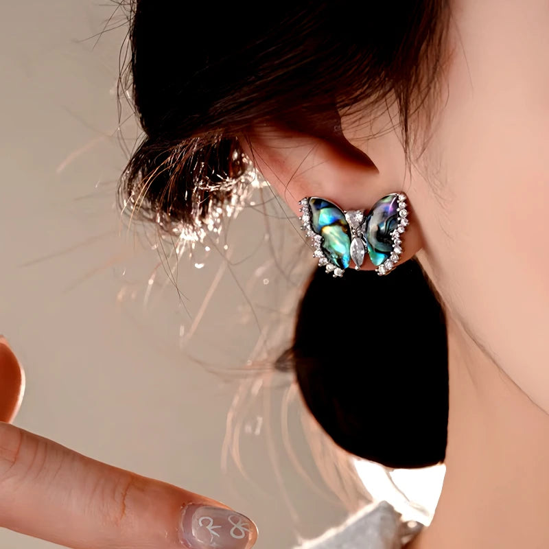 Angled view of the 14K Gold-Plated Elegant Zircon Butterfly Stud Earrings