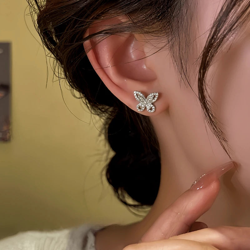 Close-up detail of the sparkling zircons and plating on the Butterfly Stud Earrings