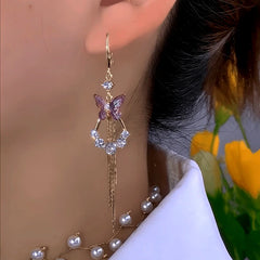Close-up detail of the sparkling zircons and plating on the Purple Butterfly Earrings