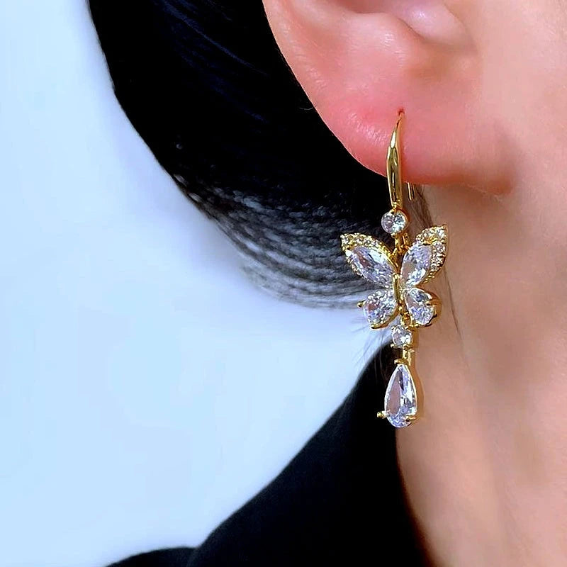 Close-up detail of the sparkling zircons and plating on the Butterfly Ear Hooks