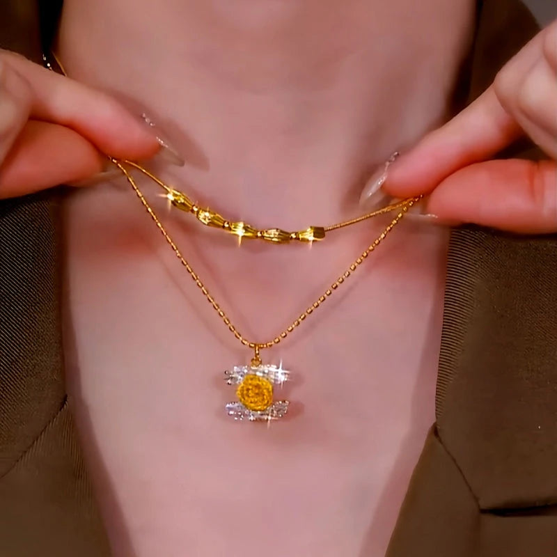 Close-up of the pendant and clasp on the Rose Necklace