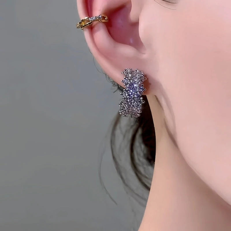 Close-up detail of the sparkling zircons and plating on the Zircon Hoop Earrings