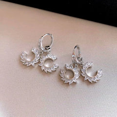 Angled view of the 14K Gold-Plated Elegant Zircon C-Shaped Earrings