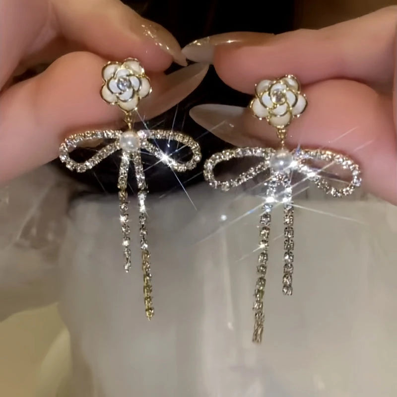 Close-up detail of the sparkling zircons and plating on the Camellia Pearl Earrings