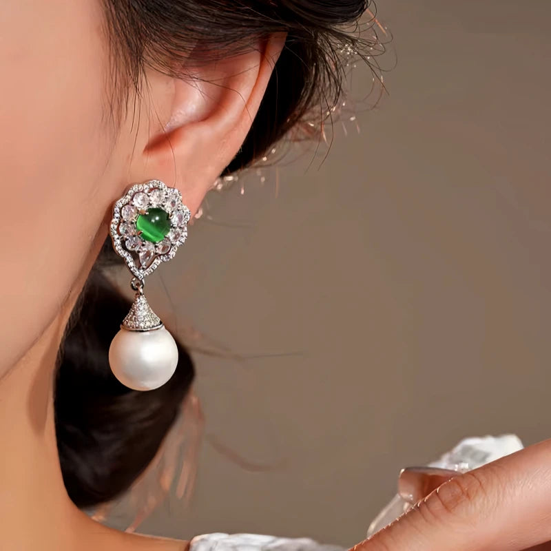 Close-up detail of the sparkling zircons and plating on the Cat's Eye Pearl Earrings