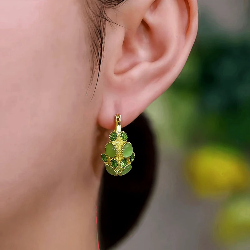 Close-up detail of the sparkling zircons and plating on the Cat's Eye Dangle Earrings