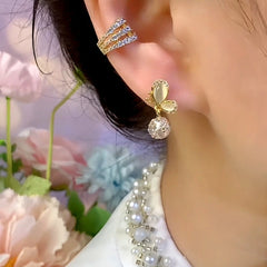 Close-up detail of the sparkling zircons and plating on the Cat's Eye Butterfly Earrings