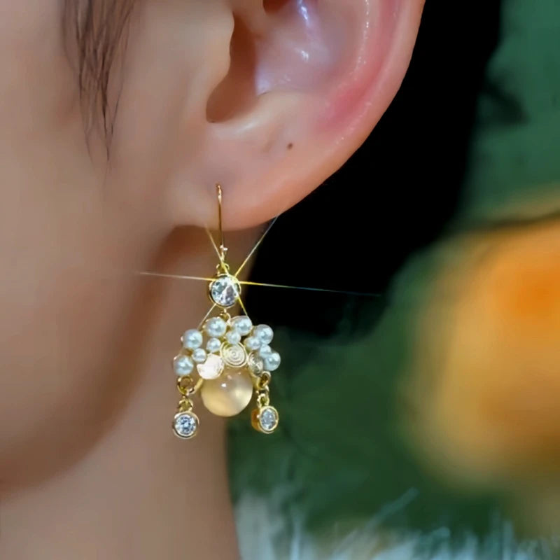 Close-up detail of the sparkling zircons and plating on the Cat's Eye Ear Hooks