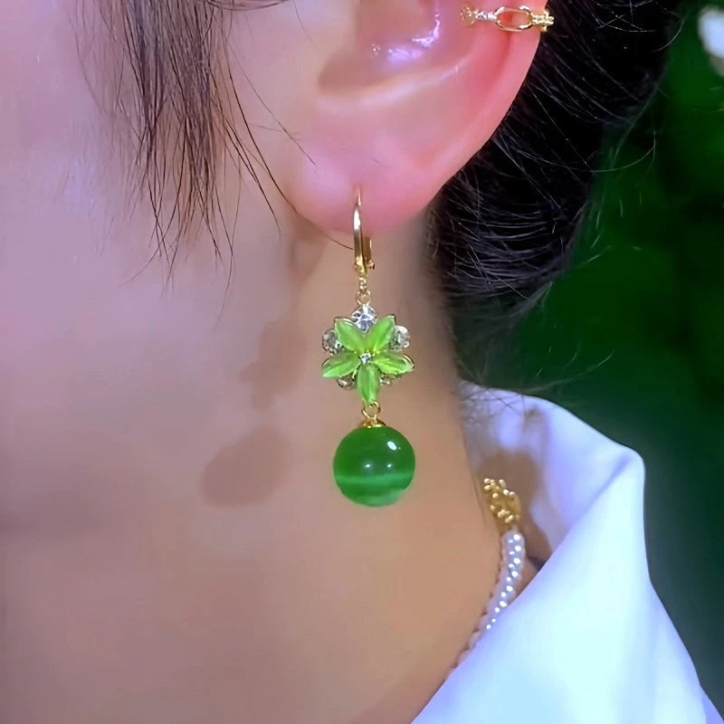 Close-up detail of the sparkling zircons and plating on the Flower Bead Earrings