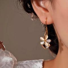 Close-up detail of the sparkling zircons and plating on the Flower Ear Hooks