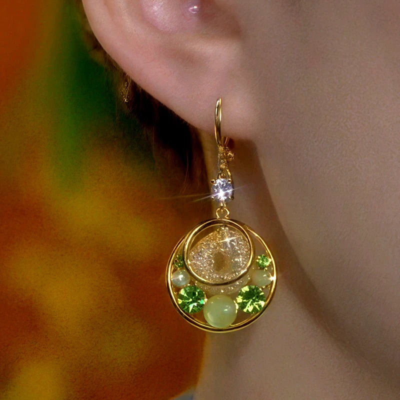 Close-up detail of the sparkling zircons and plating on the Cat's Eye Hoop Earrings