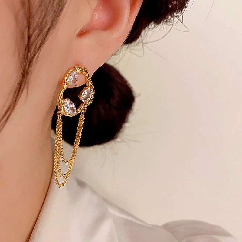 Close-up detail of the sparkling zircons and plating on the Chain Tassel Earrings