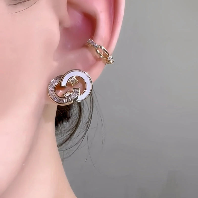 Close-up detail of the sparkling zircons and plating on the Classic Stud Earrings