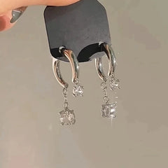 Close-up detail of the sparkling zircons and plating on the Silver Tassel Earrings