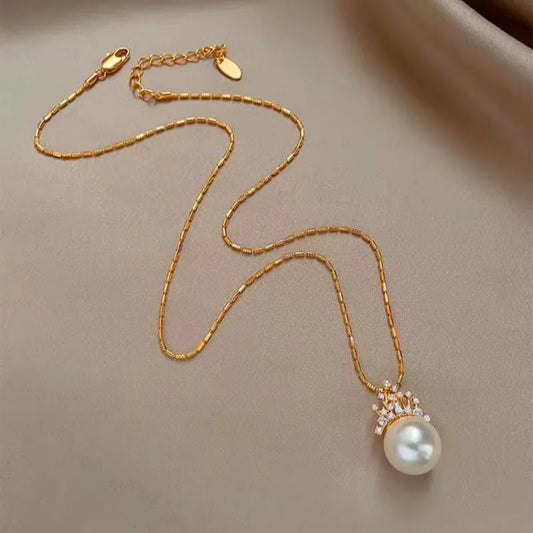 14K Gold-Plated Elegant Zircon Crown Pearl Pendant Necklace worn to showcase its length and pendant detail