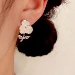 Close-up detail of the sparkling zircons and plating on the Crystal Flower Earrings