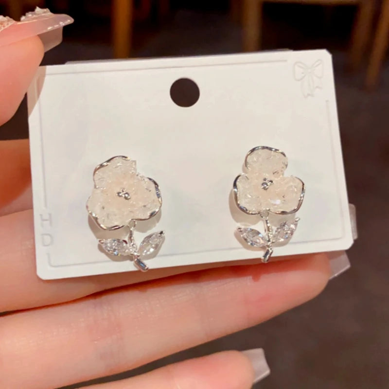 Angled view of the 14K Gold-Plated Elegant Zircon Crystal Flower Earrings