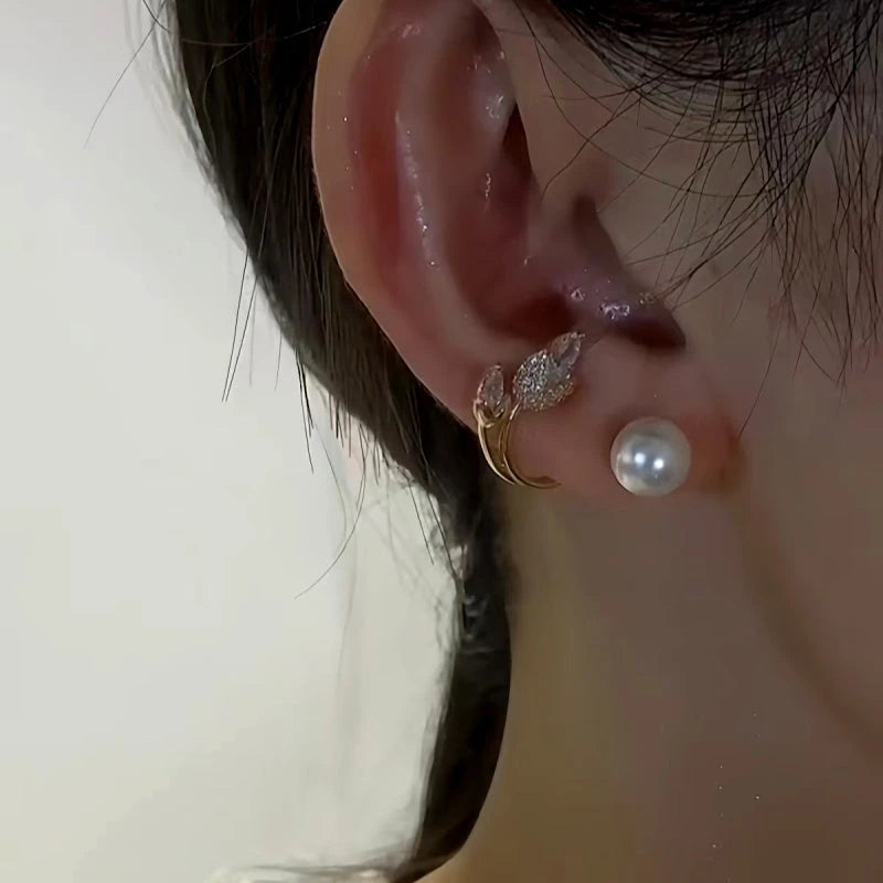 Close-up detail of the sparkling zircons and plating on the Pearl Jacket Earrings