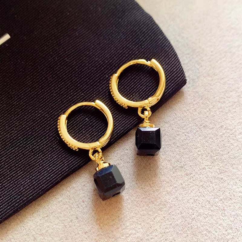 Angled view of the 14K Gold-Plated Elegant Zircon Cube Earrings