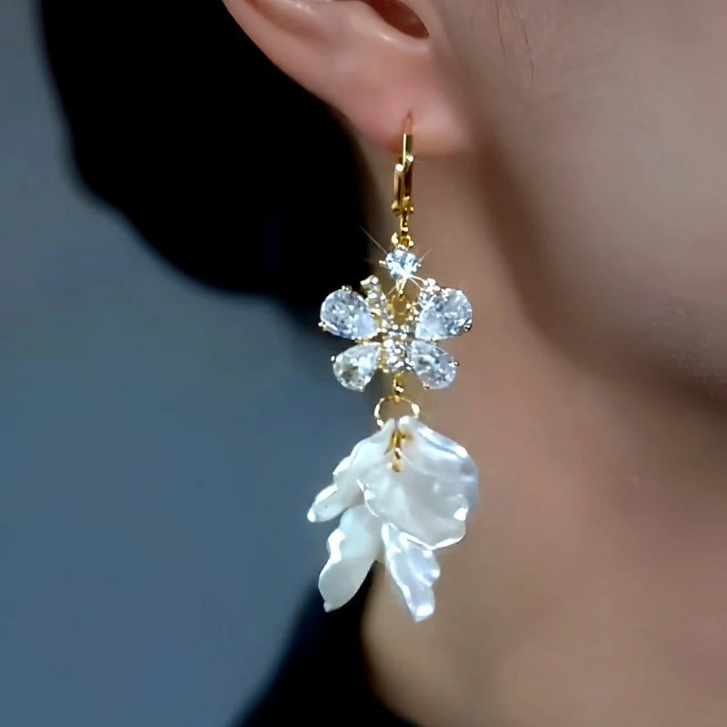 Model showcasing the dangle and style of the 14K Gold-Plated Elegant Zircon DIamond Butterfly Tassel Earrings