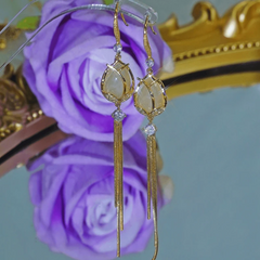 Angled view of the 14K Gold-Plated Elegant Zircon Diamod Tulip Ear Hook Tassel Earrings