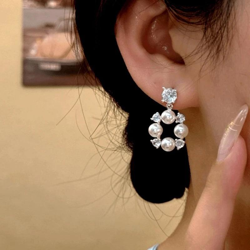Close-up detail of the sparkling zircons and plating on the Bead Earrings
