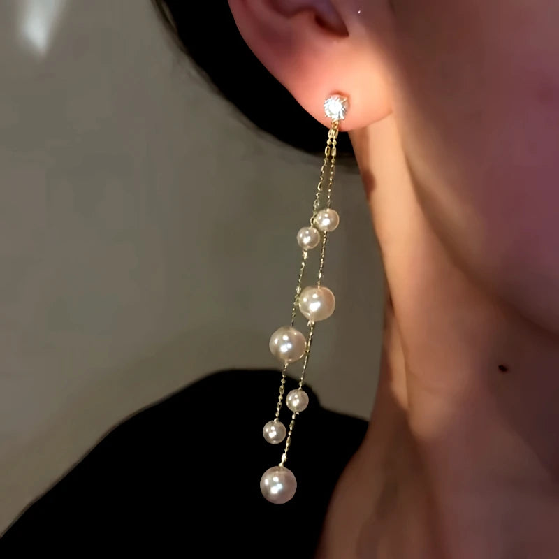 Close-up detail of the sparkling zircons and plating on the Bead Tassel Earrings