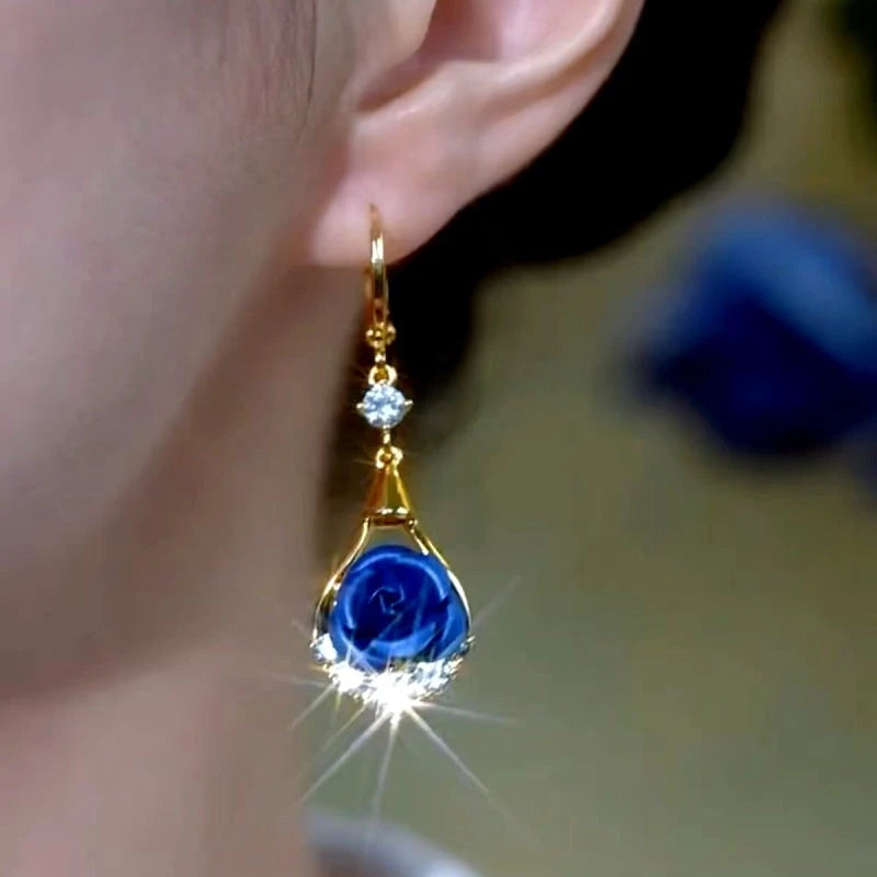 Close-up detail of the sparkling zircons and plating on the Blue Rose Earrings