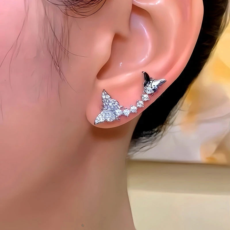 Close-up detail of the sparkling zircons and plating on the Butterfly Crawler Earrings