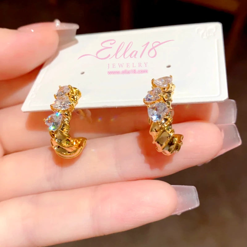 Close-up detail of the sparkling zircons and plating on the Pave Hoop Earrings