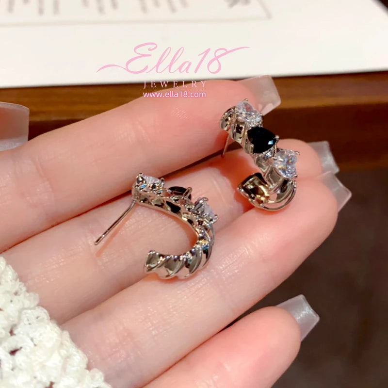 Angled view of the 14K Gold-Plated Elegant Zircon Diamond C-Shaped Earrings