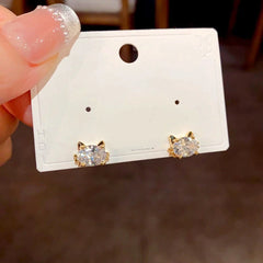 Close-up detail of the sparkling zircons and plating on the Cat Stud Earrings