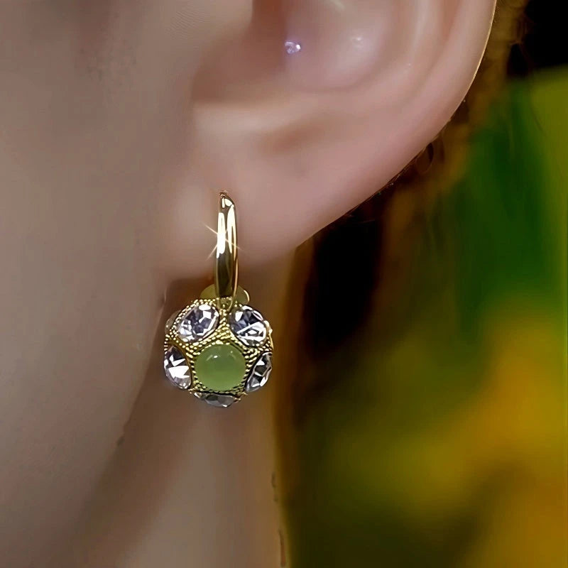 Close-up detail of the sparkling zircons and plating on the Ball Earrings