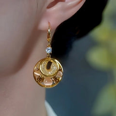 Close-up detail of the sparkling zircons and plating on the Water Drop Earrings