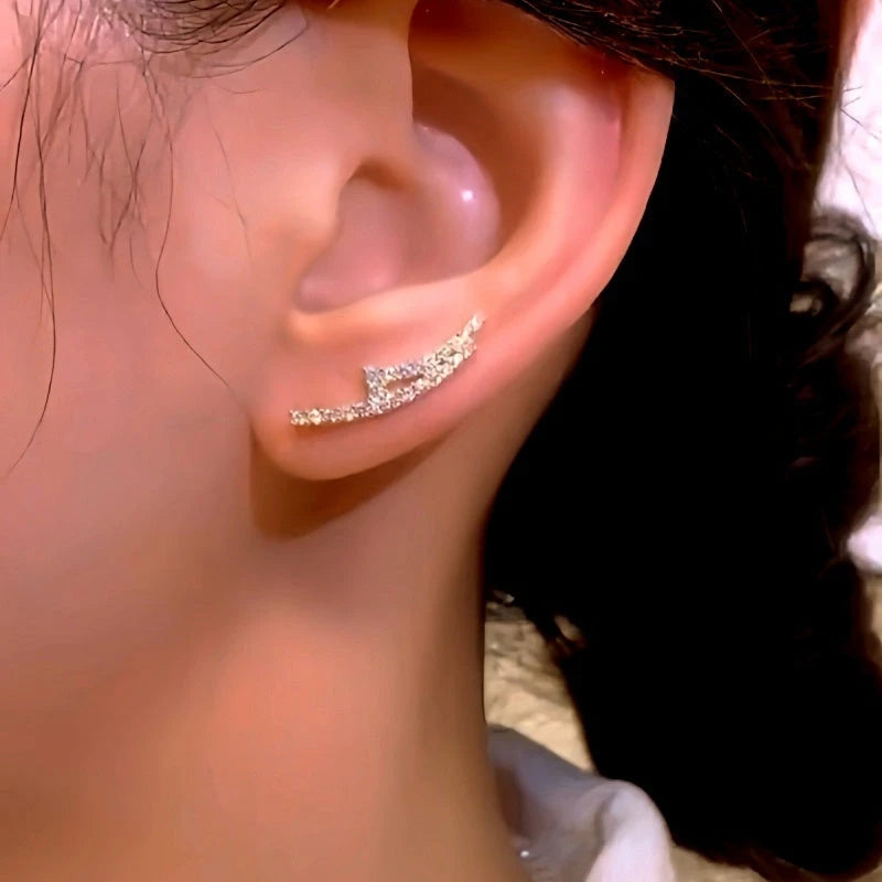 Model showcasing the dangle and style of the 14K Gold-Plated Elegant Zircon Diamond Crawlers