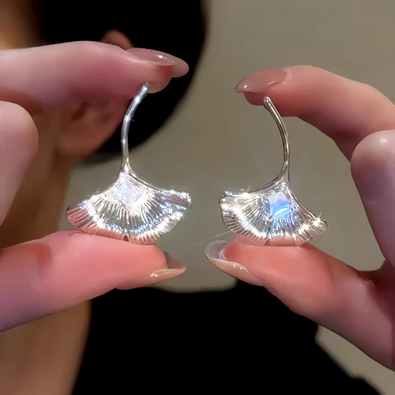 Angled view of the 14K Gold-Plated Elegant Zircon Diamond Fan-Shaped Earrings