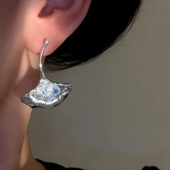 Close-up detail of the sparkling zircons and plating on the Fan Shaped Earrings