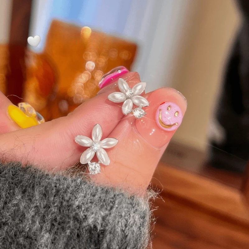 Angled view of the 14K Gold-Plated Elegant Zircon Diamond Flower Stud Earrings