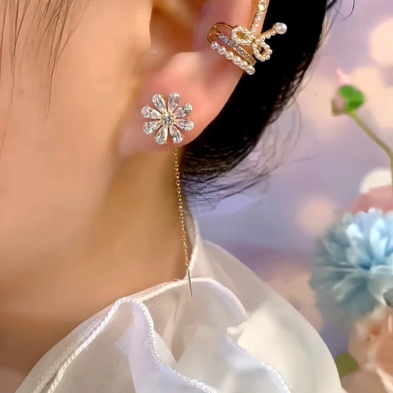 Close-up detail of the sparkling zircons and plating on the Flower Threader Earrings