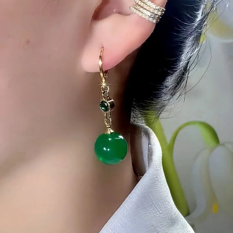 Close-up detail of the sparkling zircons and plating on the Green Bead Earrings