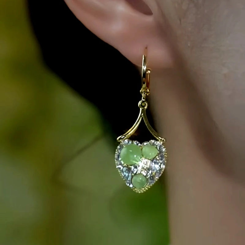 Close-up detail of the sparkling zircons and plating on the Heart Earrings