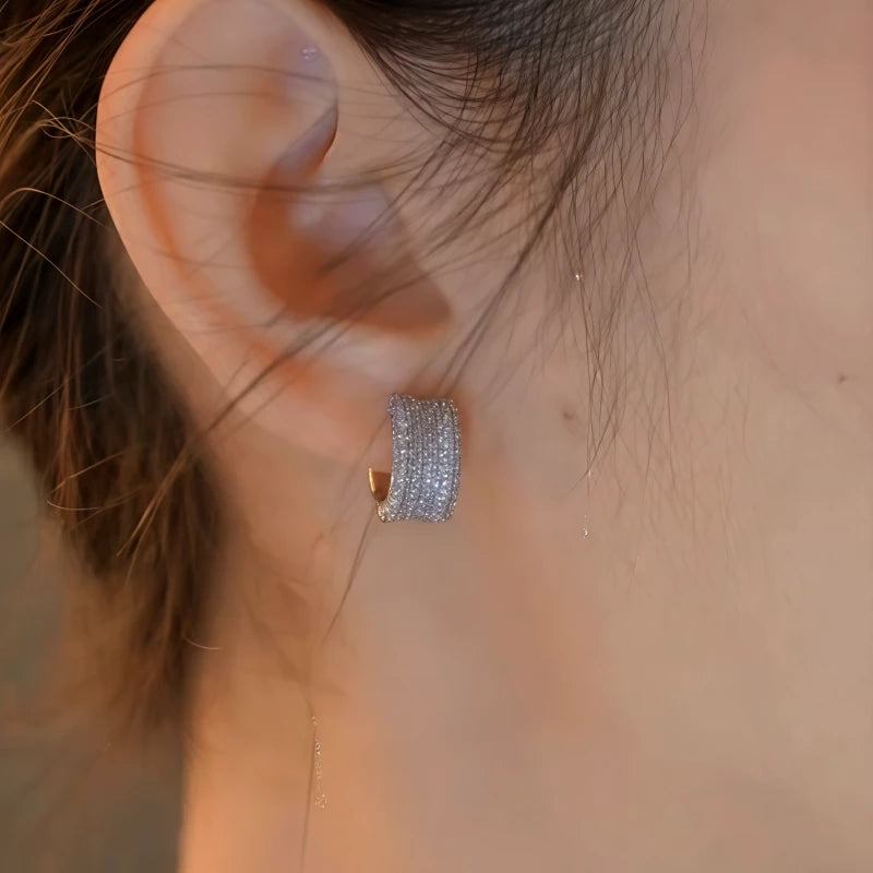 Angled view of the 14K Gold-Plated Elegant Zircon Diamond Hoop Earrings