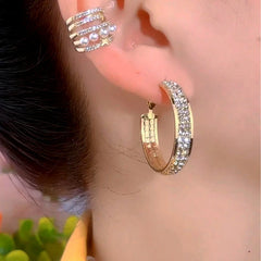 Angled view of the 14K Gold-Plated Elegant Zircon Diamond Hoop Earrings