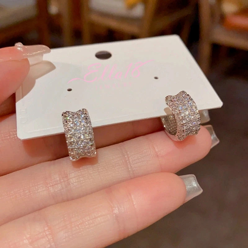 Close-up detail of the sparkling zircons and plating on the Hoop Earrings