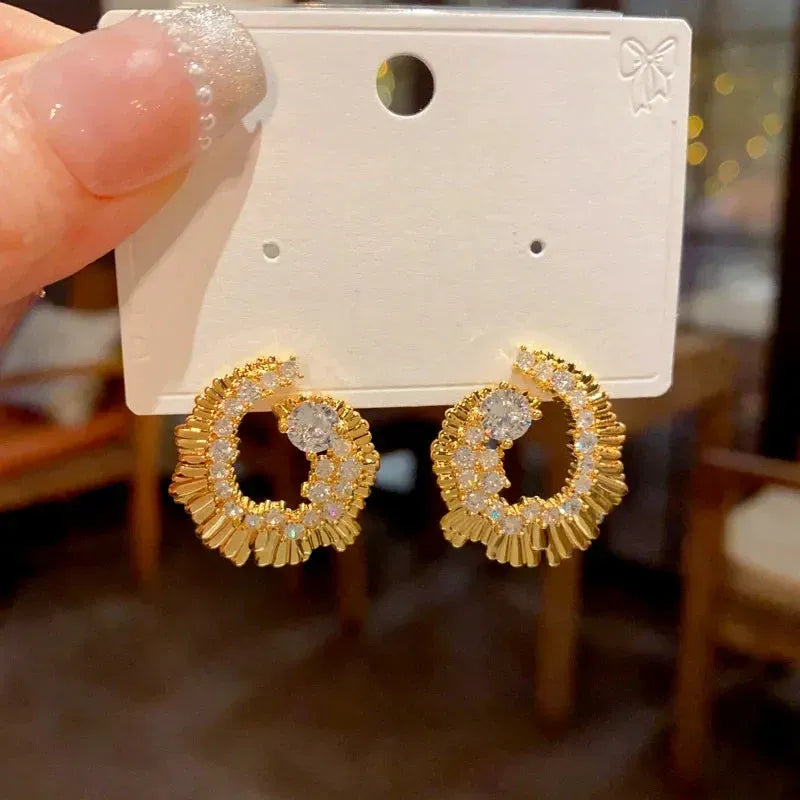 Close-up detail of the sparkling zircons and plating on the Irregular Earrings